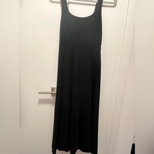 Aritzia black dress. Maxi length with side leg slit. Wilfred. Size small